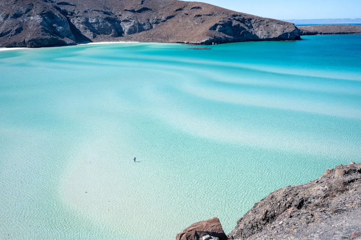 Turquoise water and a bright tropical beach.